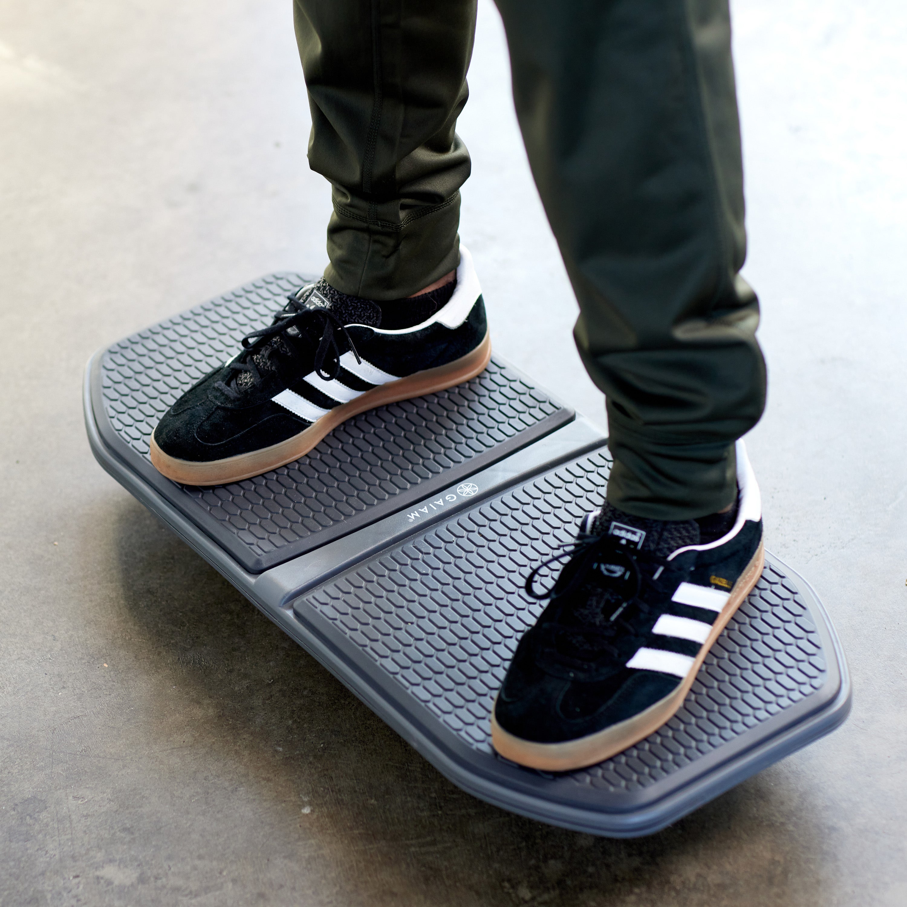 Up close of person standing on the Evolve Balance Board